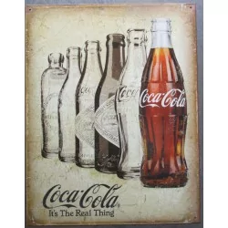 plaque soda coca cola vieilles bouteilles sur fond beige aspect vieillit , the real thing usa
