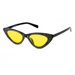 lunette de soleil femme avec nombreux stass noir verre jaune pin up rockabilly