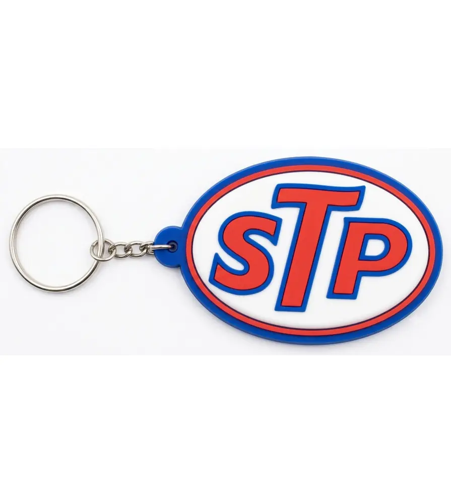 porte clé STP blanc ecrit rouge plastique souple huile usa