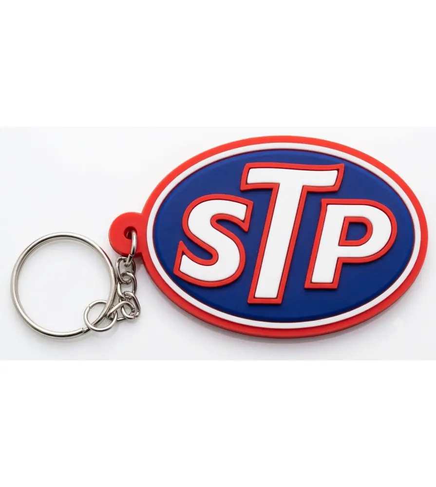 porte clé STP bleu ecrit blanc plastique souple huile usa